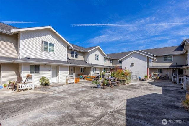2401 SW Brandon St Unit 210, Seattle, WA 98106 - view of patio / terrace with a residential view