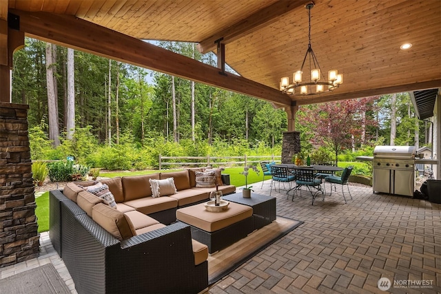26507 SE Old Black Nugget Rd, Issaquah, WA 98029 - view of patio featuring an outdoor living space, outdoor dining space, a view of trees, and grilling area