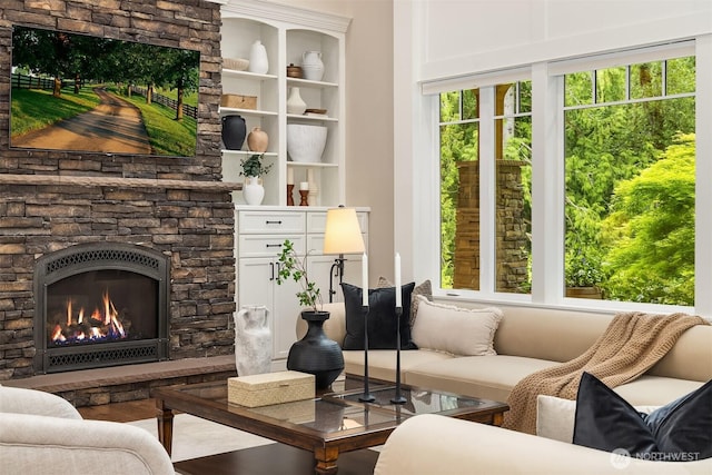 26507 SE Old Black Nugget Rd, Issaquah, WA 98029 - living room featuring a stone fireplace