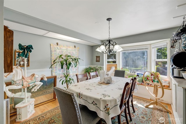10825 4th Ave W, Everett, WA 98204 - dining space with light wood-style flooring and a chandelier