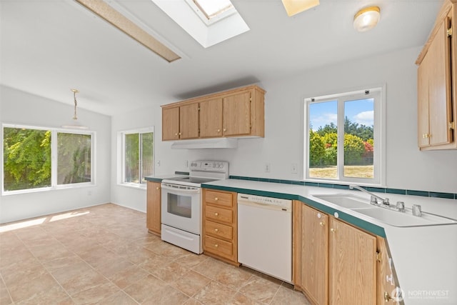 140 Big Sky Ln, Sequim, WA 98382 - kitchen featuring white appliances, a skylight, healthy amount of natural light, and under cabinet range hood