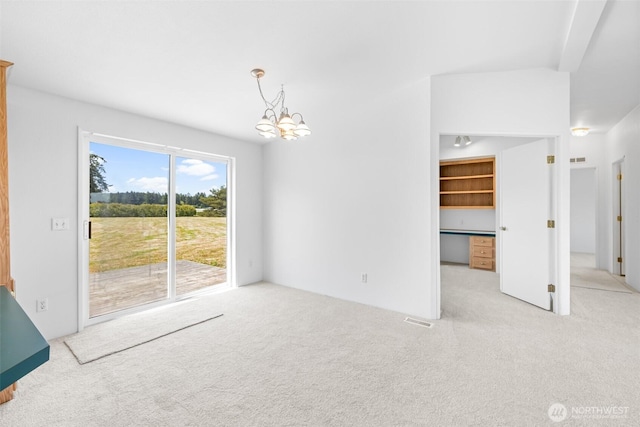140 Big Sky Ln, Sequim, WA 98382 - carpeted empty room with a chandelier