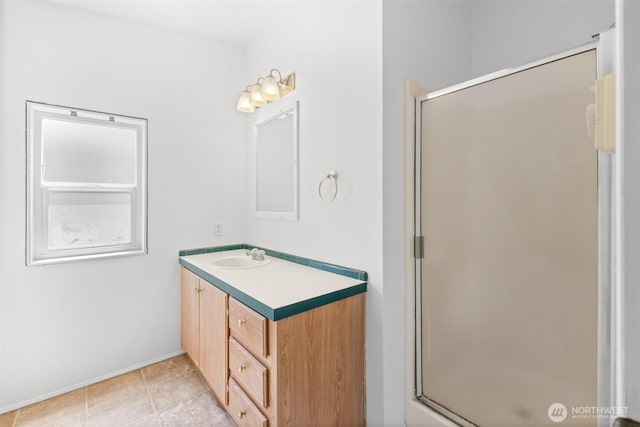 140 Big Sky Ln, Sequim, WA 98382 - bathroom with vanity, a shower stall, baseboards, and tile patterned flooring