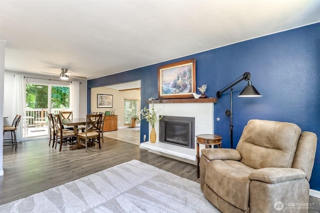 23310 133rd Ct SE, Kent, WA 98042 - living area featuring a ceiling fan, wood finished floors, and a fireplace