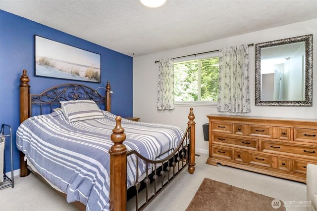 23310 133rd Ct SE, Kent, WA 98042 - carpeted bedroom with a textured ceiling and baseboards