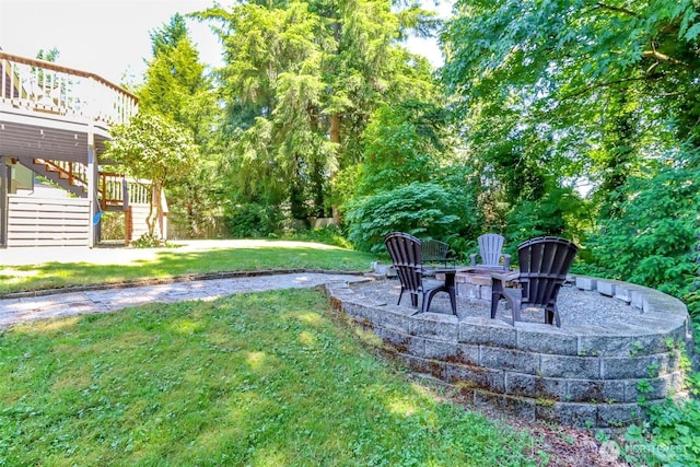 23310 133rd Ct SE, Kent, WA 98042 - view of grassy yard with stairs, an outdoor fire pit, and a deck