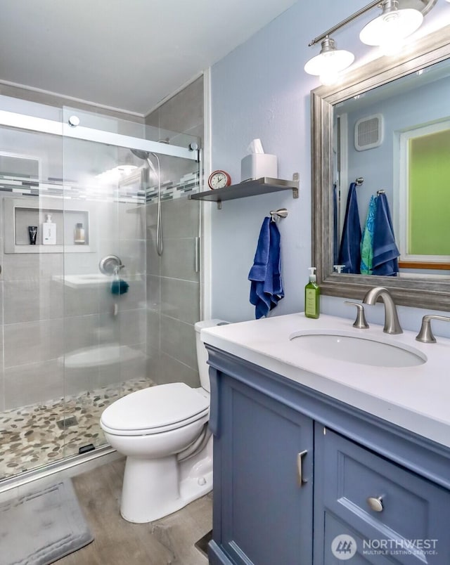 23310 133rd Ct SE, Kent, WA 98042 - bathroom featuring vanity, a stall shower, and wood finished floors
