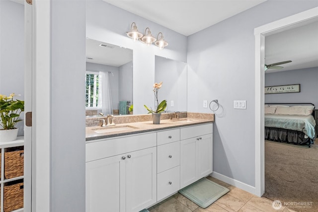 5609 Stetson Ct NW, Olympia, WA 98502 - ensuite bathroom featuring double vanity and ceiling fan