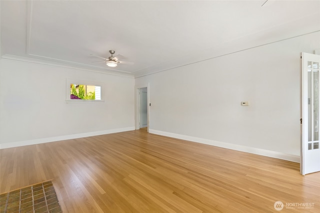 4918 S 3rd Ave, Everett, WA 98203 - unfurnished room featuring ceiling fan, light wood finished floors, and ornamental molding