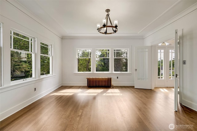 4918 S 3rd Ave, Everett, WA 98203 - interior space featuring radiator, a chandelier, plenty of natural light, and ornamental molding