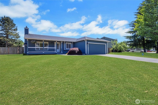25320 153rd St E, Buckley, WA 98321 - single story home with a porch, concrete driveway, an attached garage, and a chimney