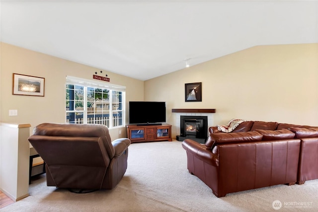 25320 153rd St E, Buckley, WA 98321 - living area with lofted ceiling, a glass covered fireplace, and light carpet