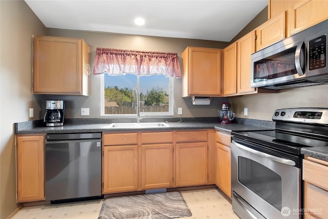 25320 153rd St E, Buckley, WA 98321 - kitchen with appliances with stainless steel finishes, a sink, light flooring, light brown cabinetry, and recessed lighting