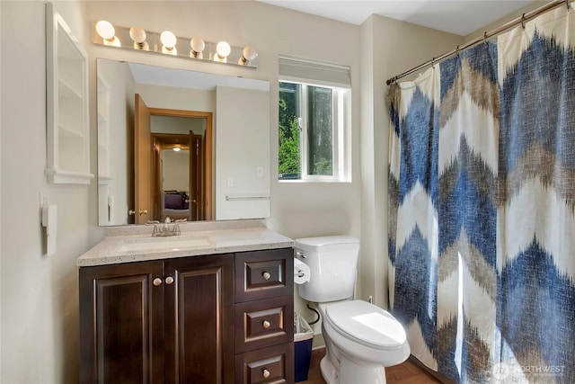 25320 153rd St E, Buckley, WA 98321 - bathroom with vanity, toilet, and a shower with curtain