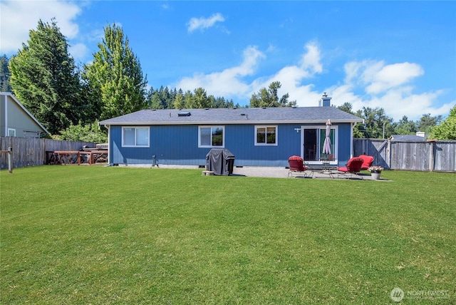 25320 153rd St E, Buckley, WA 98321 - back of house featuring a patio area and a chimney