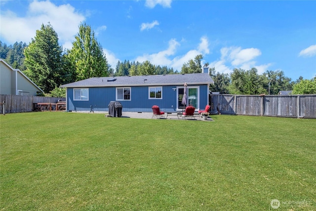 25320 153rd St E, Buckley, WA 98321 - back of property featuring a patio and a chimney