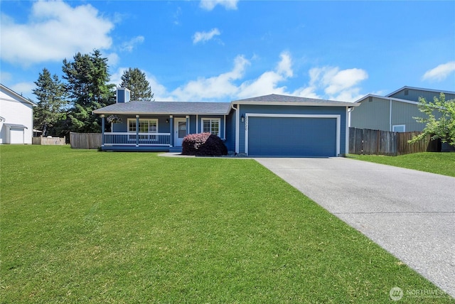 25320 153rd St E, Buckley, WA 98321 - single story home featuring a garage, concrete driveway, covered porch, and a chimney