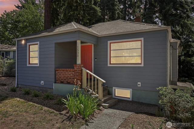 1535 NE 107th St, Seattle, WA 98125 - view of front of house featuring a chimney and roof with shingles
