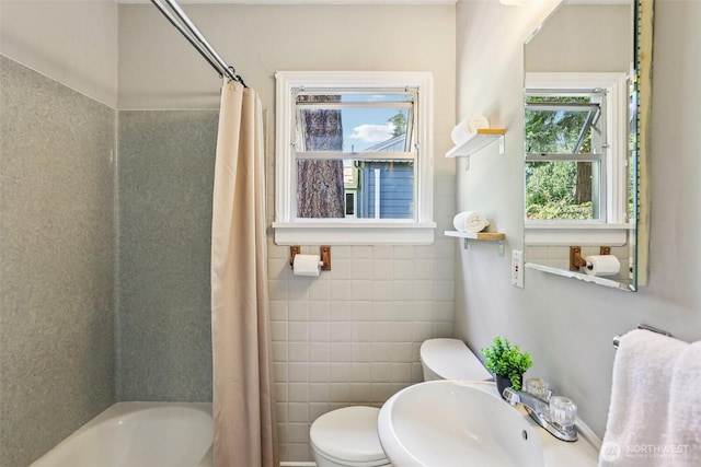 1535 NE 107th St, Seattle, WA 98125 - bathroom featuring shower / bath combination with curtain and tile walls