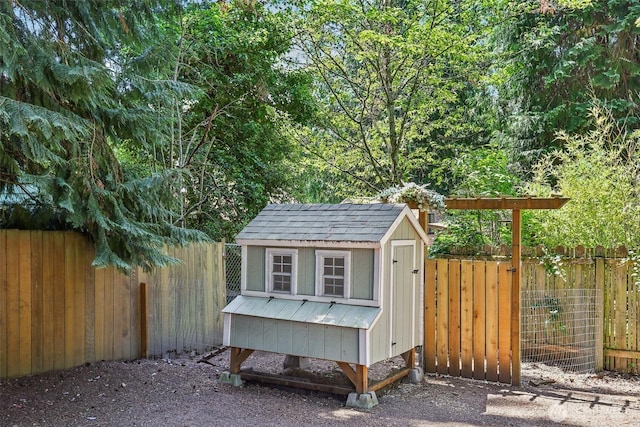 1535 NE 107th St, Seattle, WA 98125 - view of poultry coop with a fenced backyard