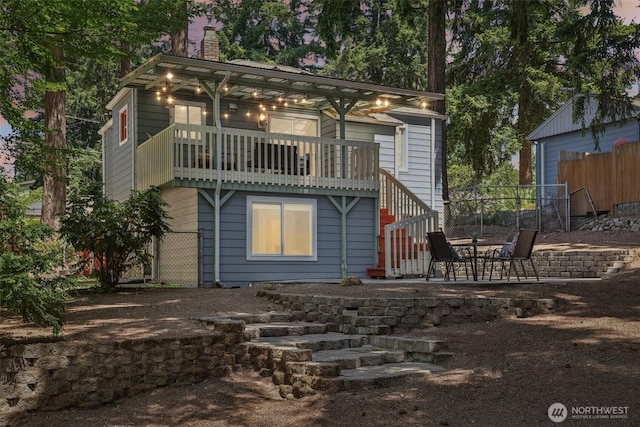 1535 NE 107th St, Seattle, WA 98125 - back of property featuring a chimney, a patio, stairs, and a balcony