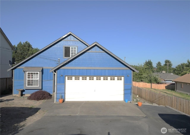 1305 Browns Point Blvd, Tacoma, WA 98422 - ranch-style house with asphalt driveway and board and batten siding