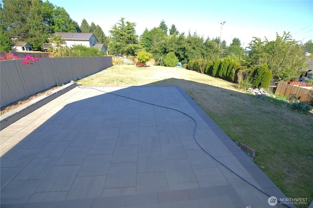 1305 Browns Point Blvd, Tacoma, WA 98422 - fenced backyard featuring a patio area