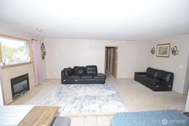 1305 Browns Point Blvd, Tacoma, WA 98422 - carpeted living area with a glass covered fireplace and baseboards