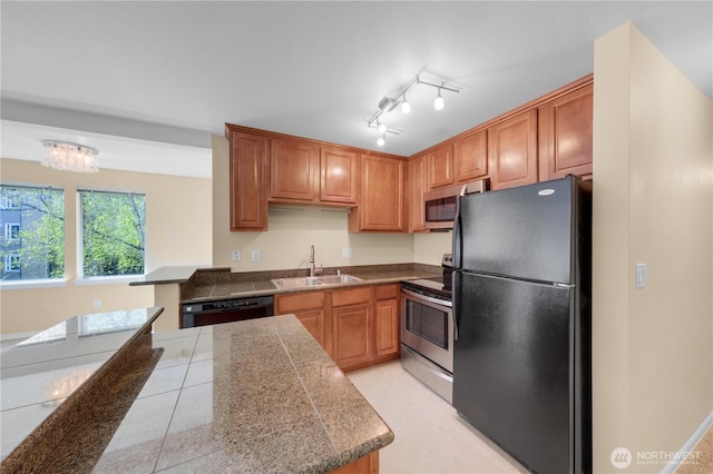 20320 Bothell-Everett Hwy Unit D204, Bothell, WA 98012 - kitchen with black appliances, tile countertops, and brown cabinets