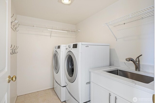 7109 SE 135th Pl, Newcastle, WA 98059 - laundry room featuring washing machine and dryer and cabinet space