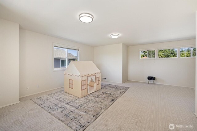 7109 SE 135th Pl, Newcastle, WA 98059 - game room with light carpet and baseboards