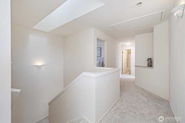 7109 SE 135th Pl, Newcastle, WA 98059 - hallway featuring attic access, an upstairs landing, and light colored carpet