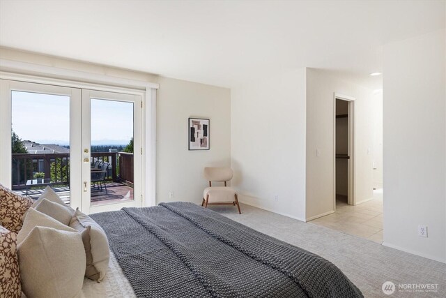7109 SE 135th Pl, Newcastle, WA 98059 - bedroom featuring light colored carpet, access to exterior, and french doors