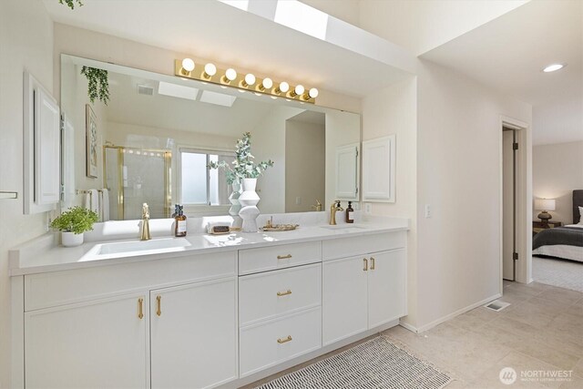7109 SE 135th Pl, Newcastle, WA 98059 - full bath featuring double vanity, ensuite bath, and a shower stall