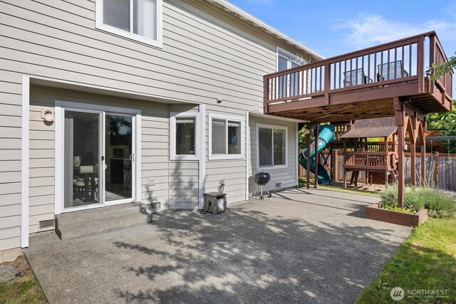 7109 SE 135th Pl, Newcastle, WA 98059 - rear view of property with a patio area and a wooden deck
