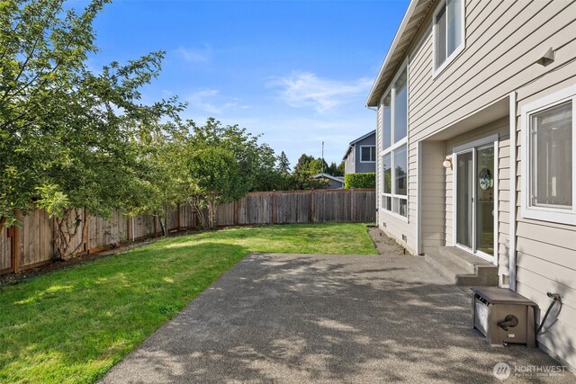 7109 SE 135th Pl, Newcastle, WA 98059 - fenced backyard with entry steps and a patio area