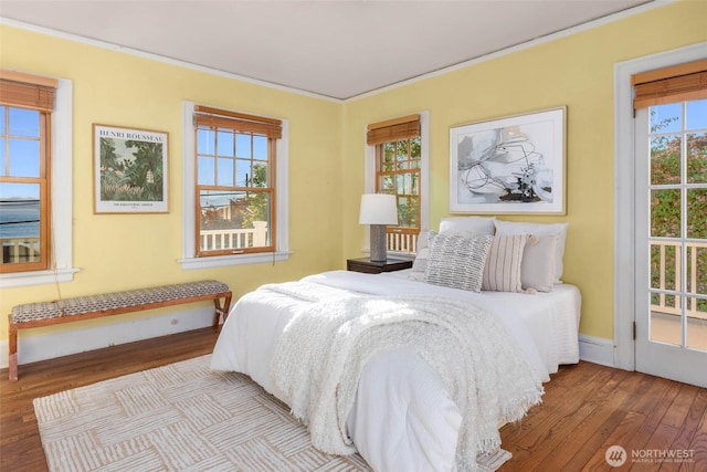 8816 Fauntleroy Way SW, Seattle, WA 98136 - bedroom with wood-type flooring and ornamental molding