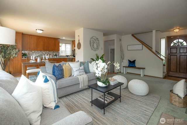3304 202nd St SW, Lynnwood, WA 98036 - living room featuring stairway and light carpet