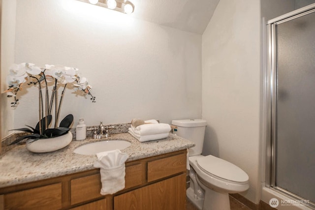 3304 202nd St SW, Lynnwood, WA 98036 - bathroom with a shower stall, vanity, and lofted ceiling