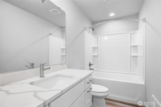 3410 102nd Ave NE, Lake Stevens, WA 98258 - bathroom featuring vanity, shower / bathtub combination, wood finished floors, toilet, and recessed lighting
