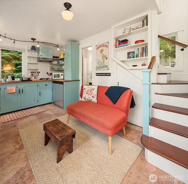 9026 SW 184th St, Vashon, WA 98070 - living room featuring stairway and track lighting