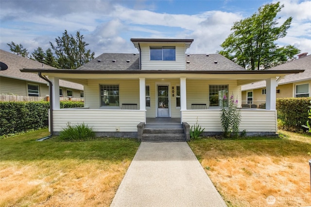 208 Barksdale Ave, Dupont, WA 98327 - bungalow with a porch, a front yard, and a shingled roof