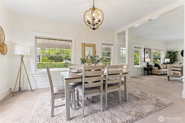 208 Barksdale Ave, Dupont, WA 98327 - dining room with carpet flooring and a chandelier