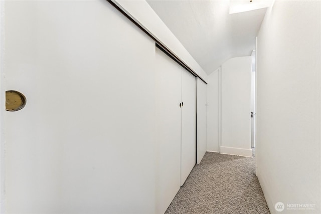208 Barksdale Ave, Dupont, WA 98327 - corridor with light colored carpet and lofted ceiling