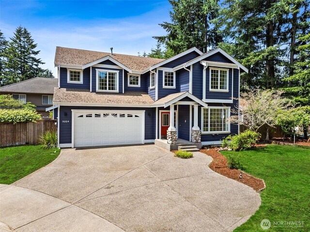 5004 98th Avenue Ct W, University Place, WA 98467 - view of front of home featuring concrete driveway, an attached garage, and roof with shingles