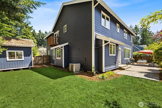 5004 98th Avenue Ct W, University Place, WA 98467 - back of house featuring a fenced backyard, a patio, and an outbuilding