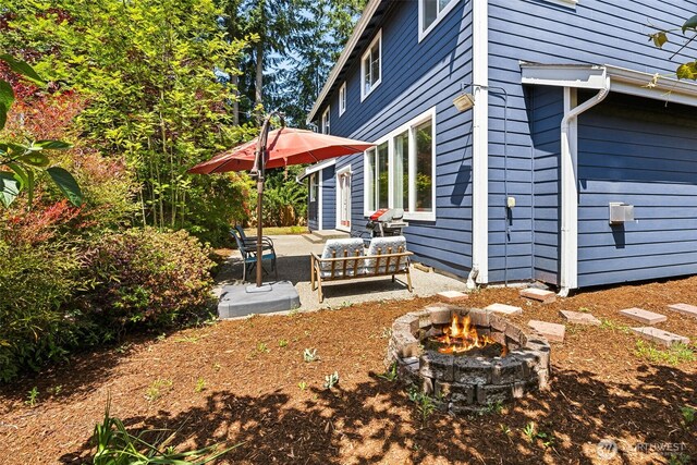 5004 98th Avenue Ct W, University Place, WA 98467 - view of yard featuring a patio and an outdoor living space with a fire pit