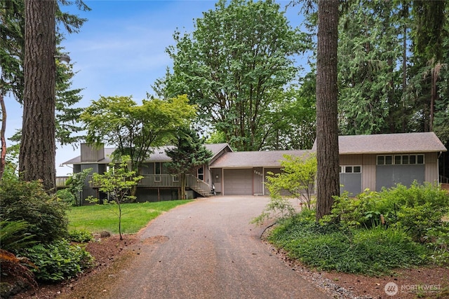 7650 SE Southworth Dr, Port Orchard, WA 98366 - single story home featuring asphalt driveway, a garage, and a front lawn