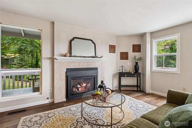 7650 SE Southworth Dr, Port Orchard, WA 98366 - living room with wood finished floors and a fireplace