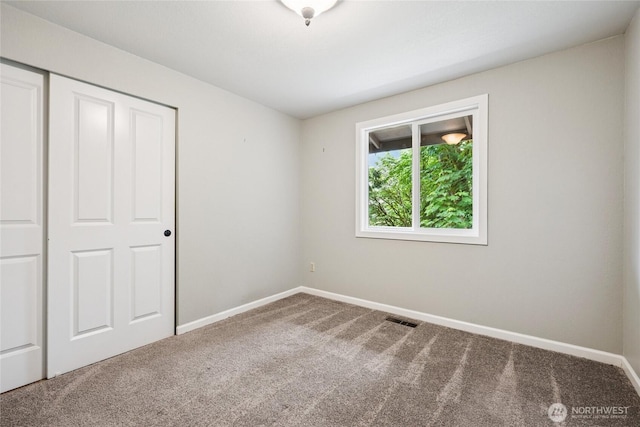 7650 SE Southworth Dr, Port Orchard, WA 98366 - unfurnished bedroom featuring carpet flooring and a closet